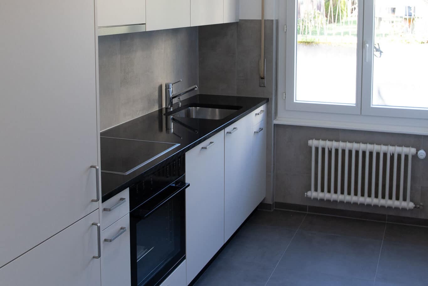 Rénovation d'une cuisine à Pully. Mobilier de cuisine et sanitaire
