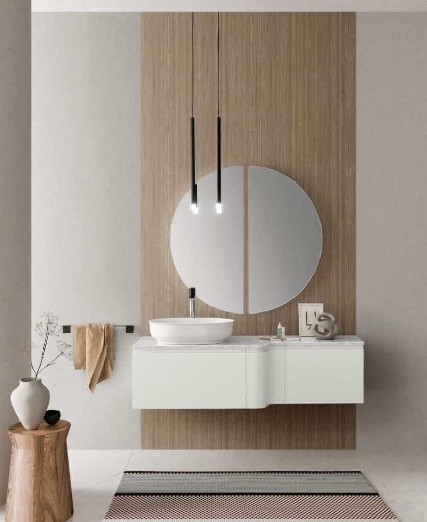 Salle de bains avec meubles moderne suspendu blanc et miroir rond